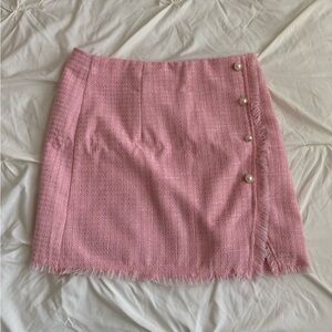 Pink tweed pencil skirt with a fringe hem